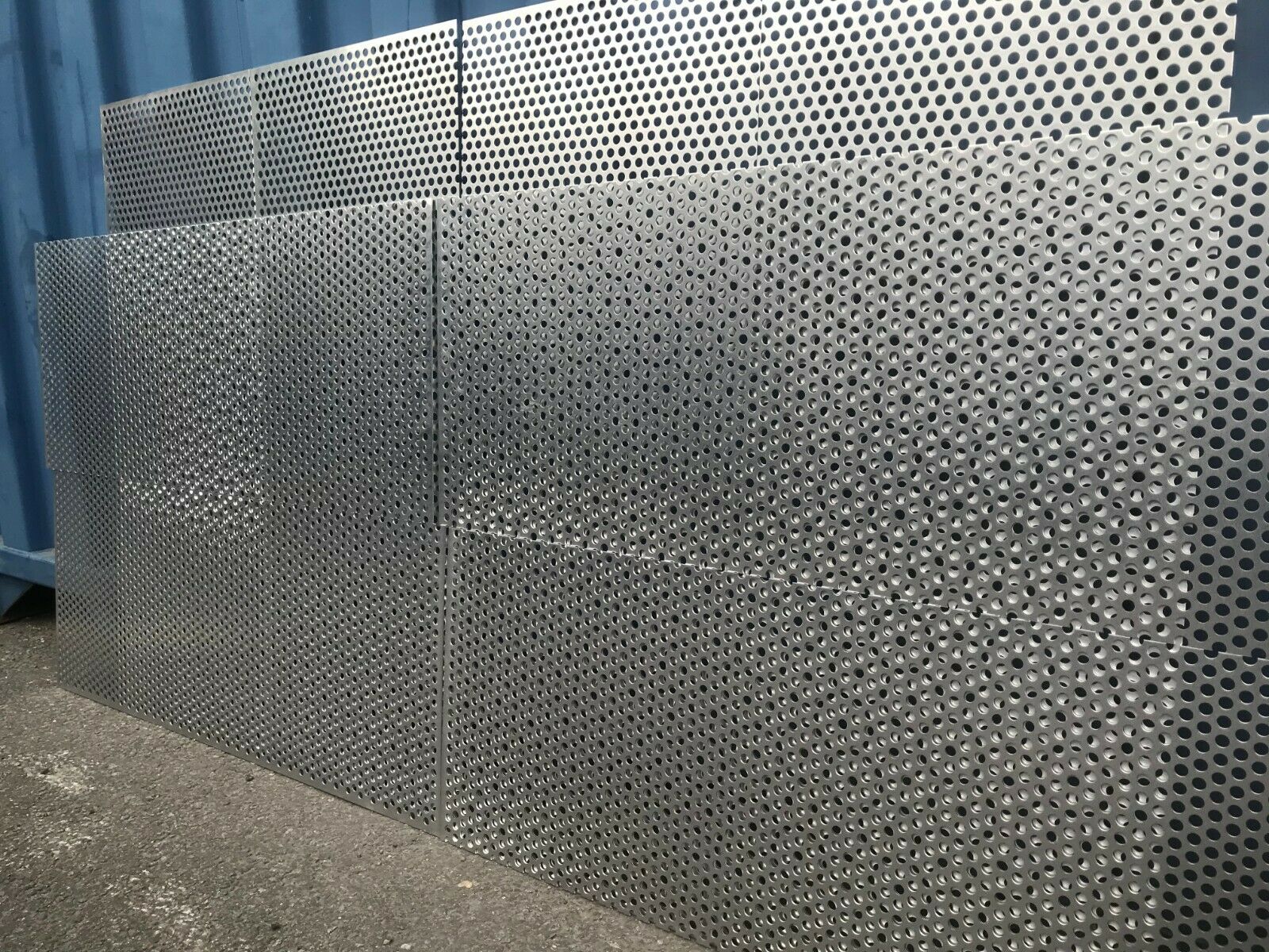 It's made from corrosion-resistant 304 stainless steel and has a selvedged border, so it's edges are smooth and it's safe to handle. It measures 1 metre in length, 500 mm in width and has a thickness of 0.55 mm. The punched holes are 2 mm in diameter and give the sheet an open area percentage of 47%. This open design makes the sheet lightweight while permitting good air circulation. For an accurate fit, the sheet is manufactured to tolerances of -5 mm/+10 mm on width and length.